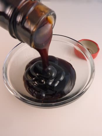 oyster sauce being poured